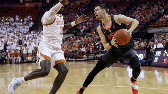 Roach and Osetkowski lead Texas over Oklahoma State 69-57