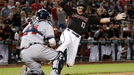 Swanson saves Braves in 10th for 5-4 win over Diamondbacks