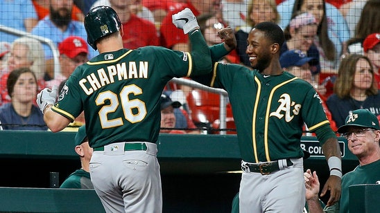 Taylor and Chapman back Mengden as A's beat Cardinals 2-0