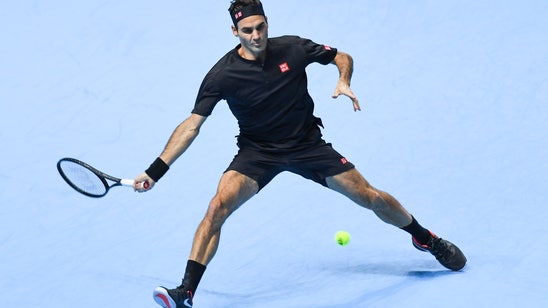 Federer beats Djokovic to reach semis at ATP Finals