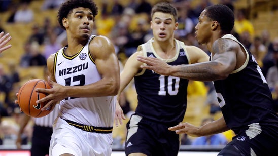 Missouri uses stingy defense to smother Wofford 75-56