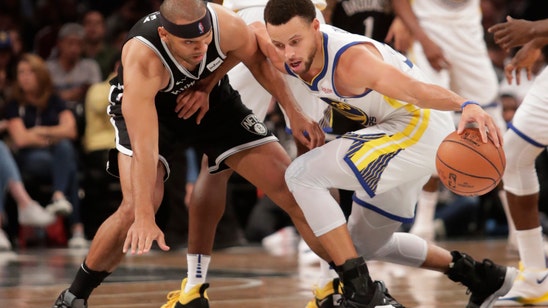 Curry’s 3-pointers carry Golden State past Nets 120-114