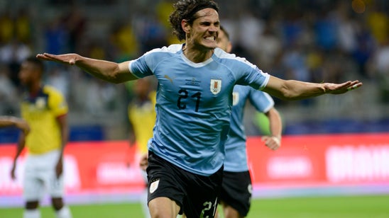 Uruguay cruises past 10-man Ecuador in Copa America opener