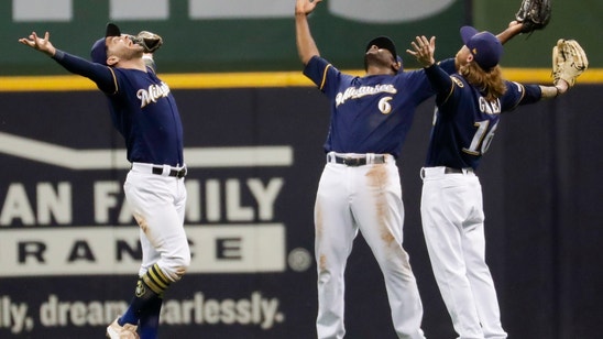 Houser posts 10 Ks, Brewers top Rangers 3-2 for 5th straight