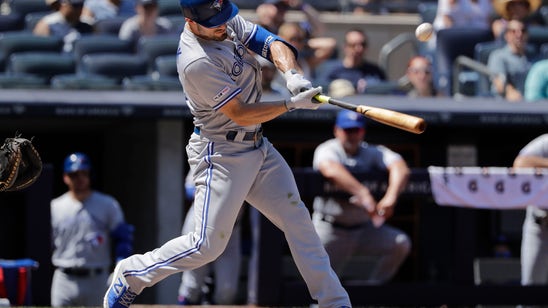 Grichuk's glove, bat help Blue Jays hold off Yanks 2-1