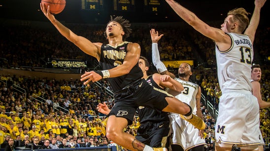 Poole scores 21, No. 7 Michigan beats No. 19 Purdue 86-57