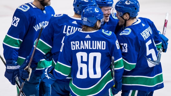 Motte scores 2 as Canucks beat Rangers 4-1