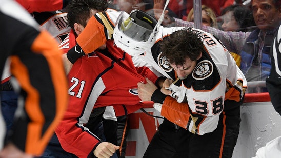 Hathaway ejected for spitting during brawl, Caps beat Ducks