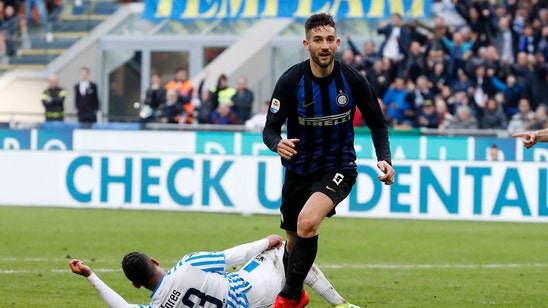 Inter beats Spal 2-0 to stay close to Milan ahead of derby