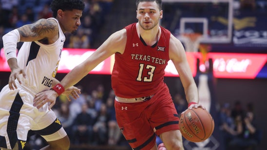 No. 11 Texas Tech holds off West Virginia 62-59