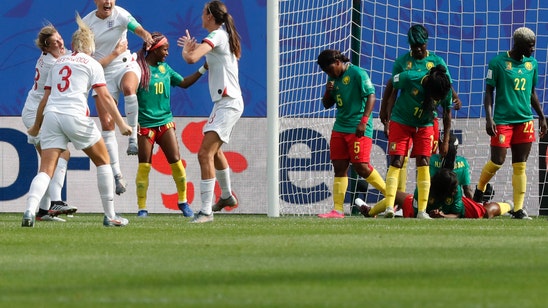England beats seething Cameroon 3-0 to advance in World Cup