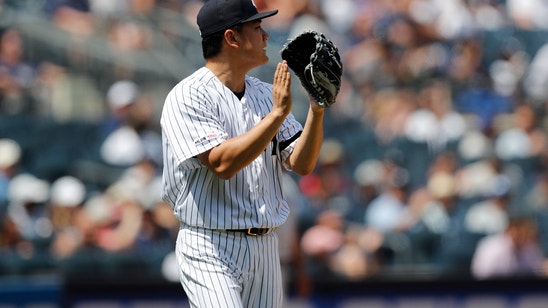 Tanaka helps Yankees earn 4-2 victory over Blue Jays