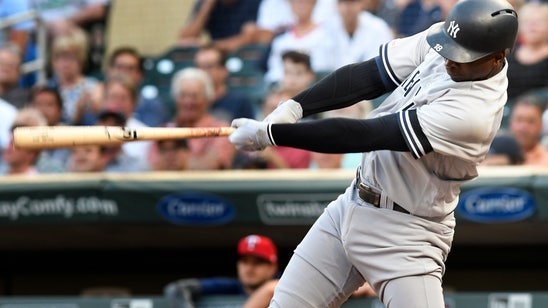 Hicks' grab, Didi's 7 RBIs lift Yanks over Twins 14-12 in 10