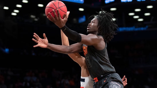 Oklahoma State beats Syracuse 86-72 in NIT Season Tip-off