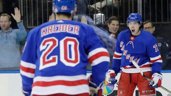 Lundqvist ties Plante on NHL wins list, Rangers beat Canucks