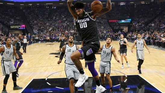 Kings hold on to end 14-game losing streak to Spurs