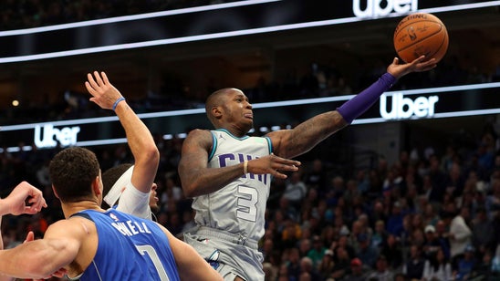 Rozier hits key shots as Hornets top Mavericks 123-120 in OT