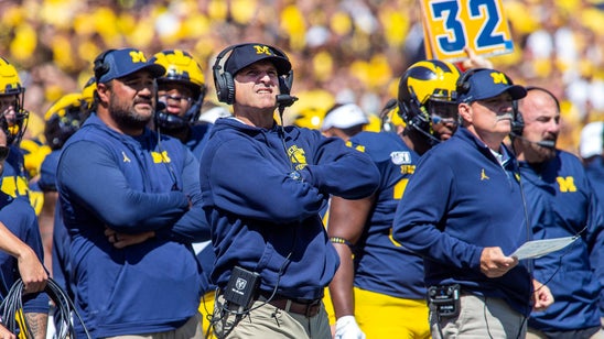 No. 7 Michigan holds on to beat Army 24-21 in 2 overtimes