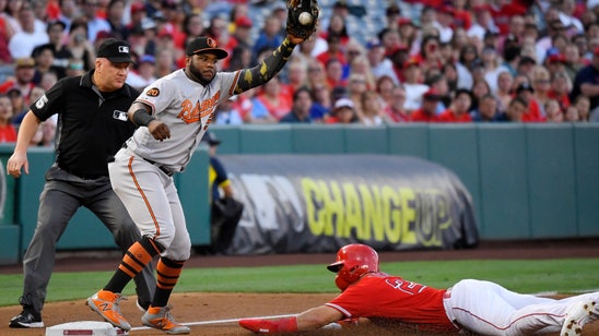 Villar homers in 16th, OF saves Orioles' 10-8 win over Halos
