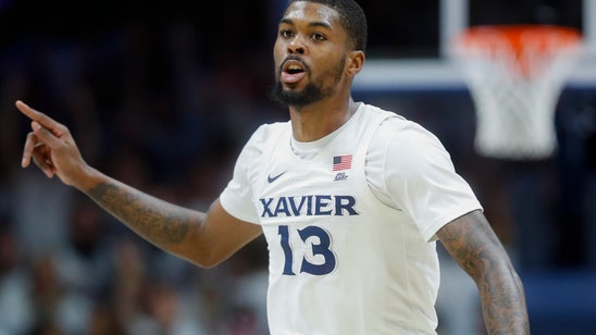 Marshall scores 31, Xavier beats rival Cincinnati 73-66