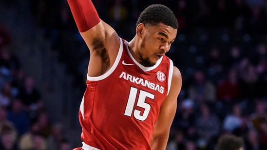 Jones hits 3 in final second of OT, Arkansas beats Jackets