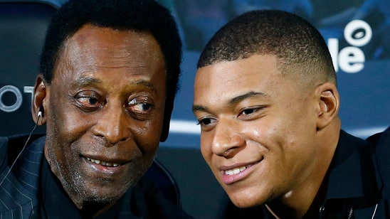 Soccer legend Pele meets rising star Mbappe in Paris