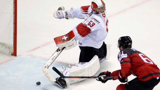 Canada escapes; US, Sweden fall in world hockey