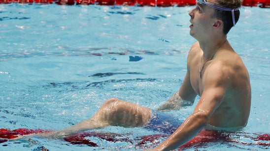 Anton Chupkov sets world record in men's 200 breaststroke