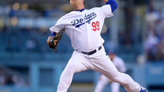 Ryu sharp, Dodgers hit 3 HRs, beat Braves 6-0 in NLDS opener