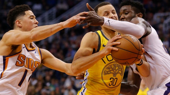 Curry’s 34 points help Warriors scorch Suns, 132-109