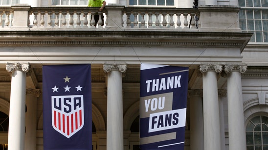 Fans celebrate World Cup champs, rally for equal pay