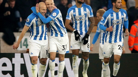 Mooy scores 2 as Huddersfield jumps to 14th from last