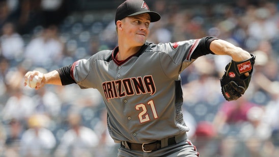 Astros ace Greinke deal; 2 dozen trades on deadline day
