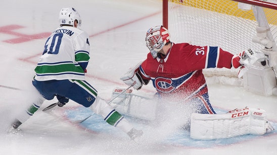 Price makes 33 saves in return, Canadiens beat Canucks 2-0