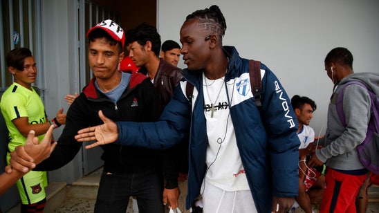 Migrants on the island of Lesbos find refuge on soccer field