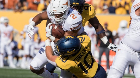 Texas tailback Johnson emerges from 'emergency' role