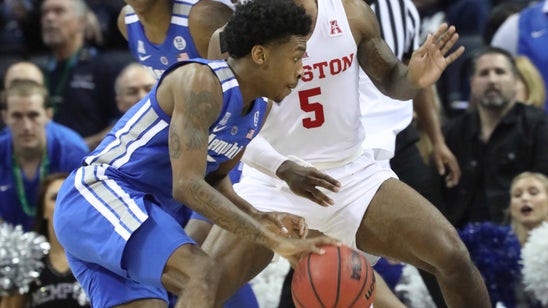 Davis, defense help No. 11 Houston hold off Memphis 61-58