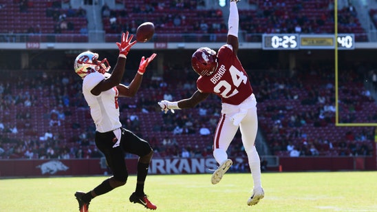 Storey leads Western Kentucky past former team Arkansas