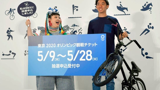 Japanese rush to buy Tokyo Olympic tickets on first day