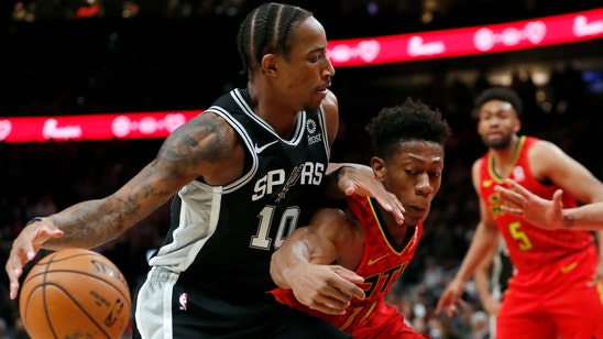 Young dazzles in 2nd half, Hawks beat Spurs without Collins