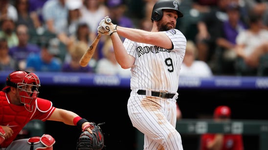McMahon leads offensive show, Rockies beat Reds 10-9