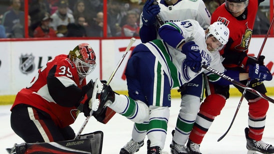 Pettersson finishes hat trick in OT, Canucks beat Sens 4-3