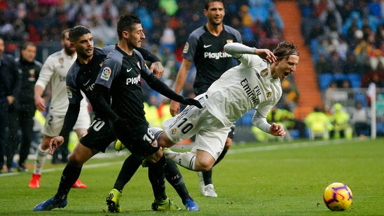 Madrid beats Sevilla 2-0, returns to top 3 in Spanish league