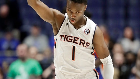 No. 22 Auburn reaches SEC tourney final, downs Florida 65-62