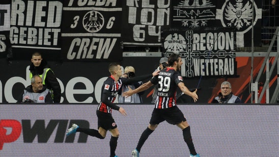 Frankfurt routs 10-man Bayern 5-1, fireworks in Berlin derby