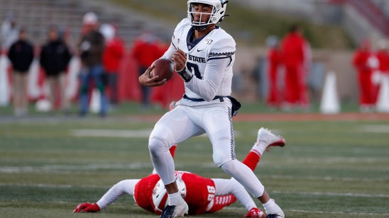 Love leads Utah State to 38-25 victory over New Mexico