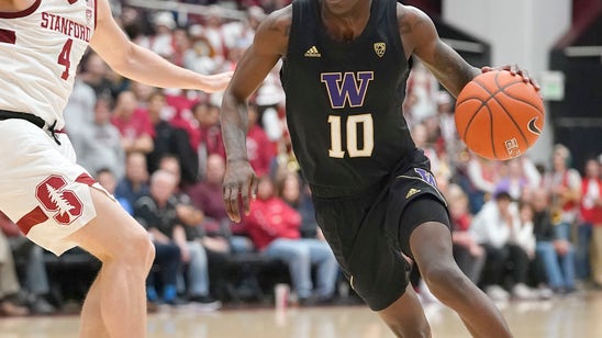 Stanford uses late rally to subdue Washington 61-55