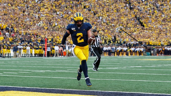 Patterson's 4 TDs helps No. 20 Michigan rout Rutgers 52-0