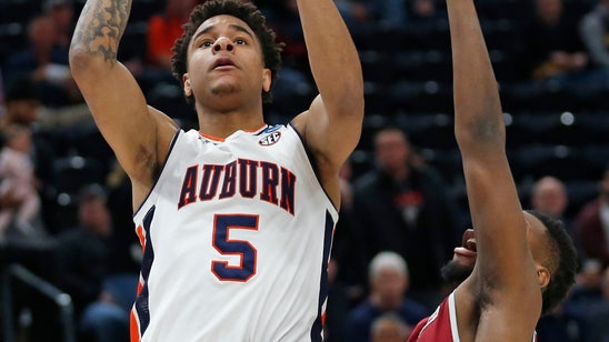 Missed FTs, late pass cost NMex St in 78-77 loss to Auburn