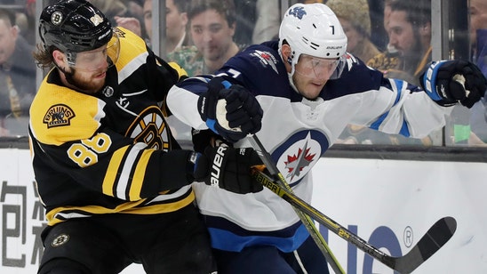 David Pastrnak records hat trick as Bruins beat Jets 5-4